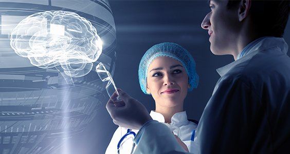Two doctors looking at a diagram of a brain
